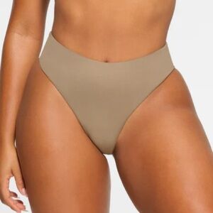 SKIMS wet jersey brief in color desert